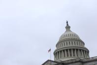 The U.S. Capitol during a morning rainstorm, after Congress agreed to a multi-trillion dollar economic stimulus package created in response to the economic fallout from the COVID-19 Coronavirus, on Capitol Hill in Washington