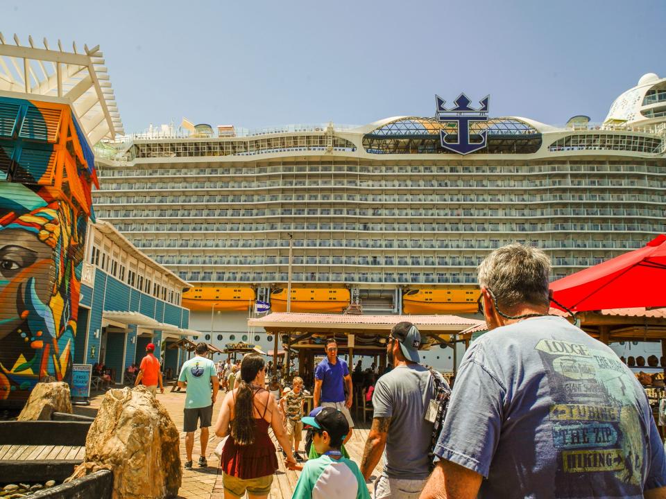 People walk around the cruise port in Honduras