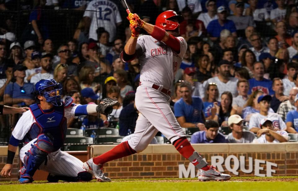 Jun 30, 2022; Chicago, Illinois, USA; Cincinnati Reds first baseman Joey Votto (19) hits a home run against the Chicago Cubs during the sixth inning at Wrigley Field.