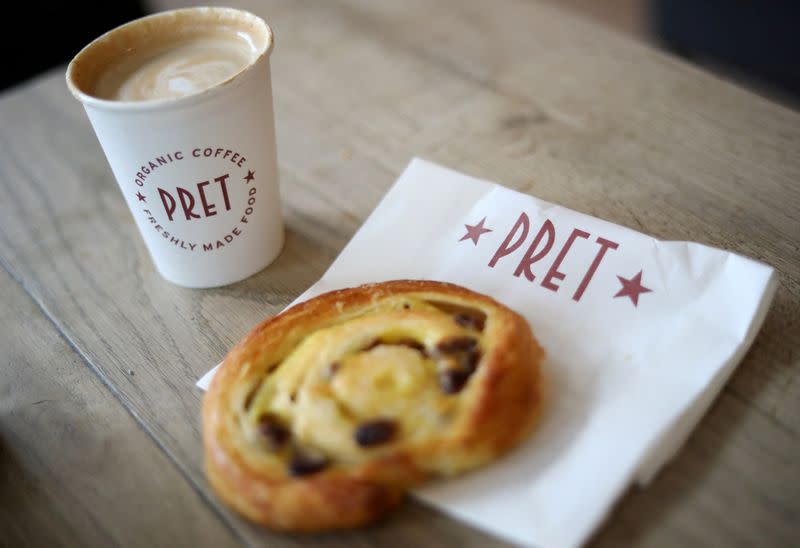 FILE PHOTO: A coffee and a pastry are seen on a table inside a Pret A Manger store in Liverpool