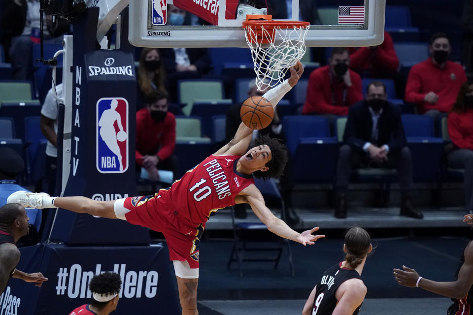 New Orleans Pelicans center Jaxson Hayes (10) misses an alley-oop pass during the first half of the team's NBA basketball game against the Miami Heat in New Orleans, Thursday, March 4, 2021. (AP Photo/Gerald Herbert)