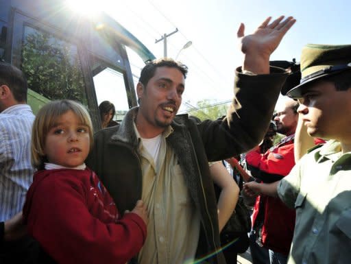 Palestinian refugees arrive on a bus in La Calera, 130 kilometres north of Santiago, as local residents welcome them in 2008. In just over a century, Chile's Palestinian community has achieved things still not possible at home: a widespread rise to prosperity, elite status and even their own football team