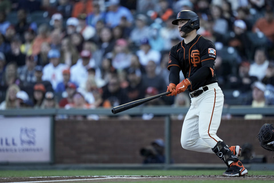 San Francisco Giants' Patrick Bailey watches his RBI single against the Texas Rangers during the first inning of a baseball game Saturday, Aug. 12, 2023, in San Francisco. (AP Photo/Godofredo A. Vásquez)