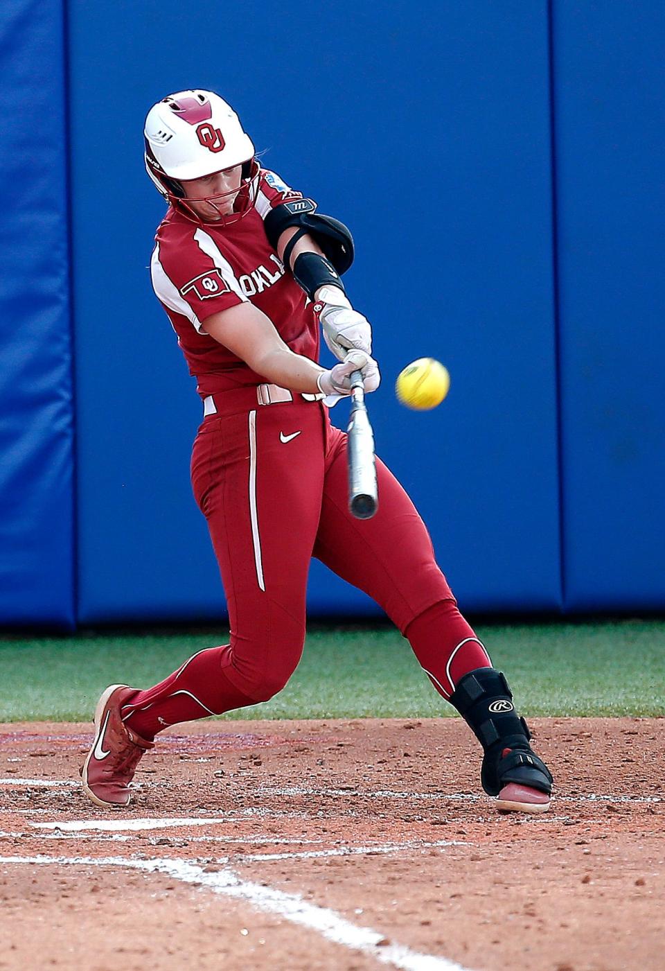 Oklahoma's Jana Johns (20) hits a home run in the third inning during the second game of Women's College World Series championship series between University of Oklahoma (OU) and Florida State University at the USA Softball Hall of Fame Stadium in Oklahoma City, Wednesday, June 9, 2021. Oklahoma won 6-2.