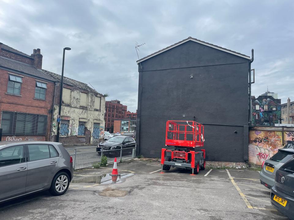 The wall had been returned to a blank state on Wednesday (Peter Byrne/PA)