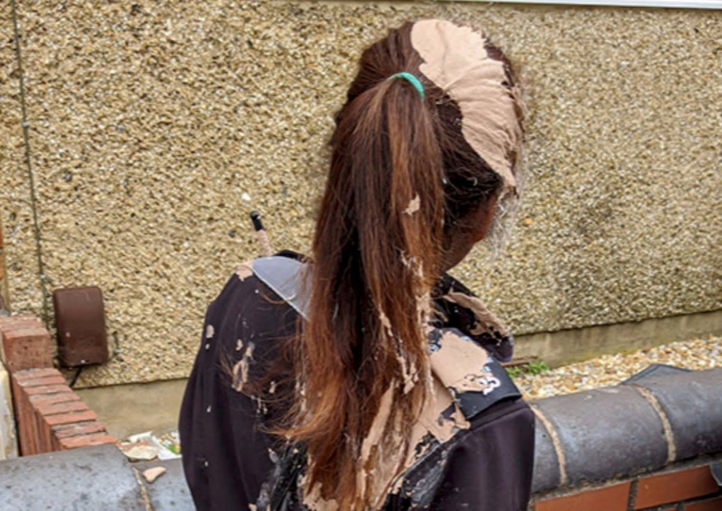 An angry motorist covered a female traffic warden in plaster (Picture: SWNS)