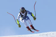 United States' Travis Ganong speeds down the course during an alpine ski, men's World Championship super-G race, in Courchevel, France, Thursday, Feb. 9, 2023. (AP Photo/Alessandro Trovati)