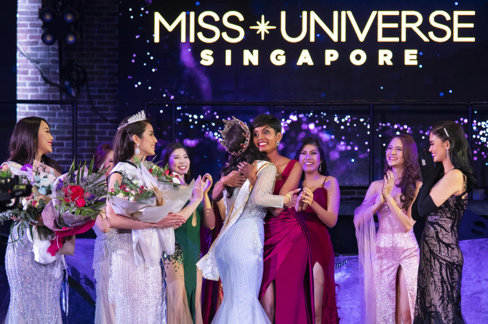 Mohana Phraba embraces Miss Universe Singapore 2018 Zahra Khanum after winning the title of 2019 Miss Universe Singapore at Zouk.