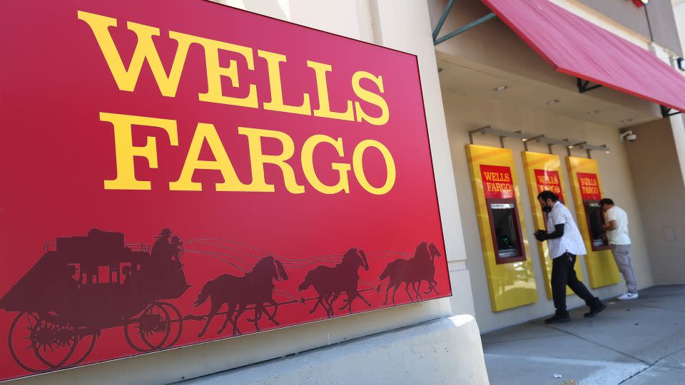 Wells Fargo customers use the ATM at a bank branch on August 08, 2023 in San Bruno, California. - Justin Sullivan/Getty Images