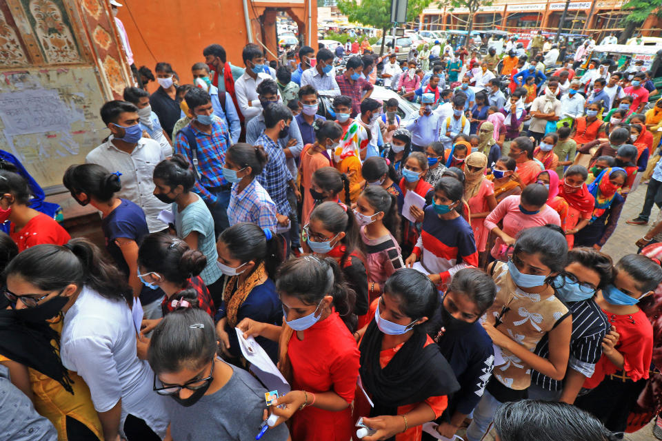 Students Crowd Outside An Examination Centre In Jaipur