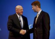 Microsoft CEO Steve Ballmer shakes hands with Nokia's Chairman of the Board Risto Siilasmaa (R) during the news conference of Finnish mobile phone manufacturer Nokia in Espoo, September 3, 2013. REUTERS/Sari Gustafsson/Lehtikuva