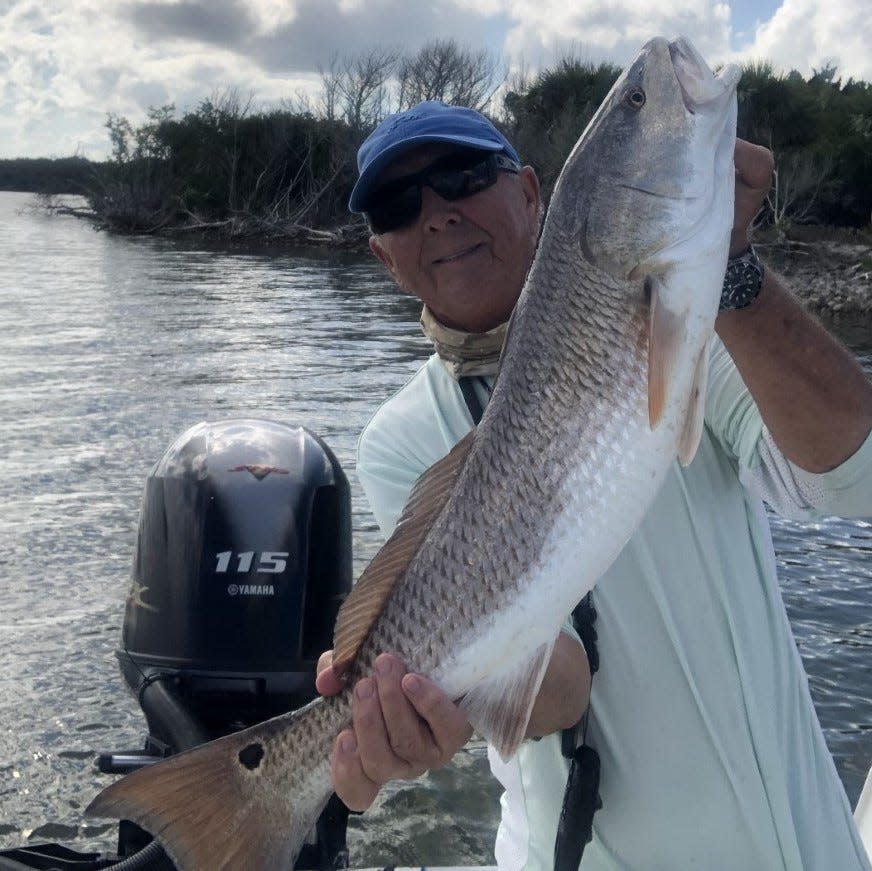 Local angler Art Mowery with a nice redfish.