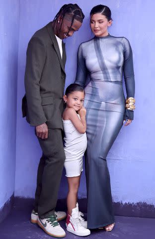 <p>Matt Winkelmeyer/Getty</p> Travis Scott, Stormi Webster and Kylie Jenner at the 2022 Billboard Music Awards.