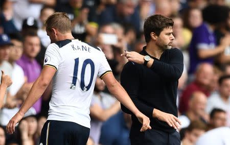 Football Soccer Britain - Tottenham Hotspur v Liverpool - Premier League - White Hart Lane - 27/8/16 Tottenham's Harry Kane walks past manager Mauricio Pochettino as he is substituted Reuters / Dylan Martinez Livepic