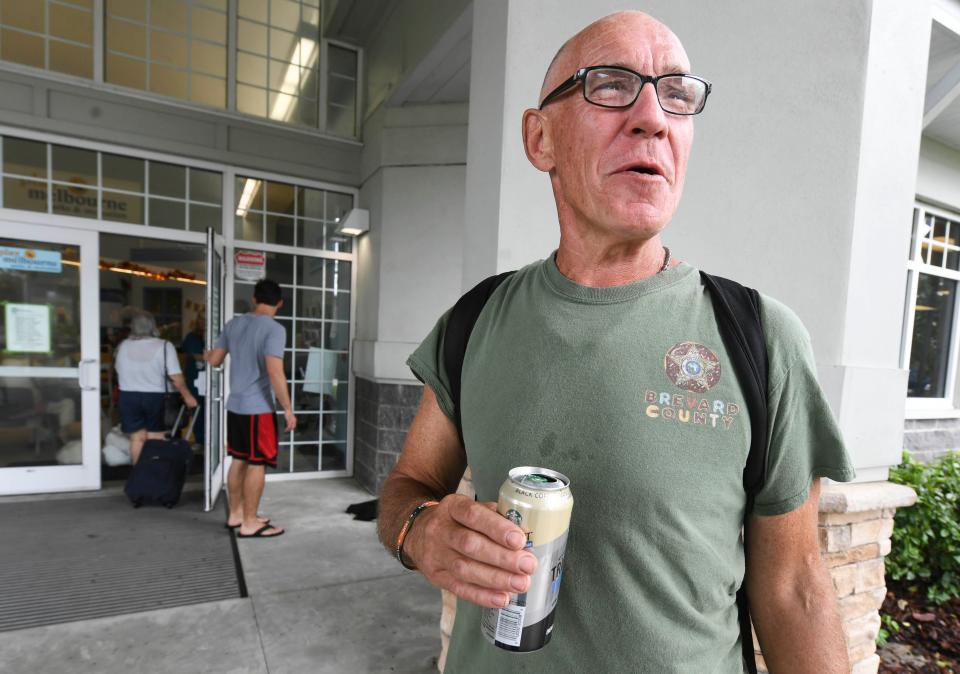 Joseph Friedrichs relaxes outside the hurricane shelter at Wickham Park in Melbourne Wednesday, September 28, 2022. Craig Bailey/FLORIDA TODAY via USA TODAY NETWORK