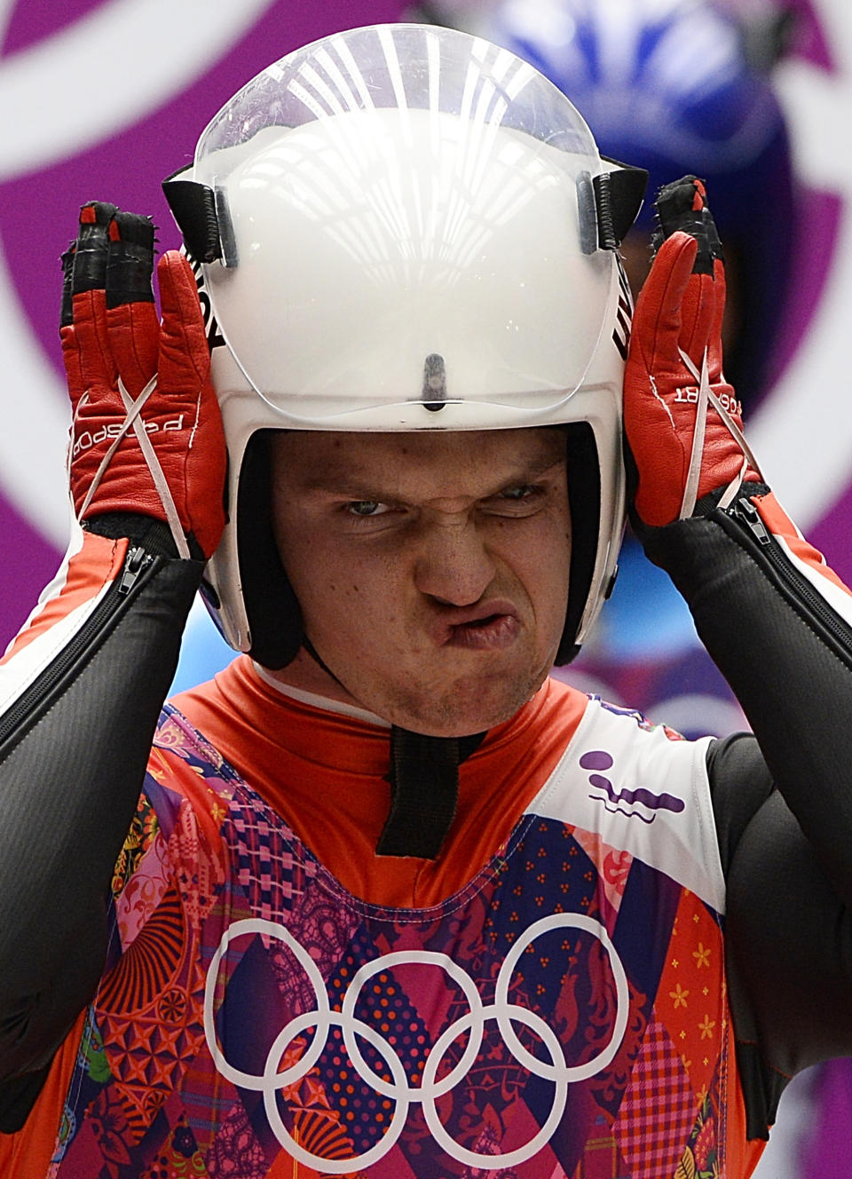 Austria's Wolfgang Kindl competes during the Men's Luge Singles run two at the Sliding Center Sanki during the Sochi Winter Olympics on February 8, 2014. 