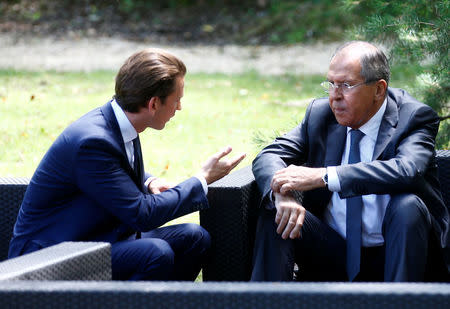 Austrian Foreign Minister Sebastian Kurz talks to Russian Foreign Minister Sergey Lavrov during an OSCE informal ministerial meeting in Mauerbach, Austria July 11, 2017. REUTERS/Leonhard Foeger