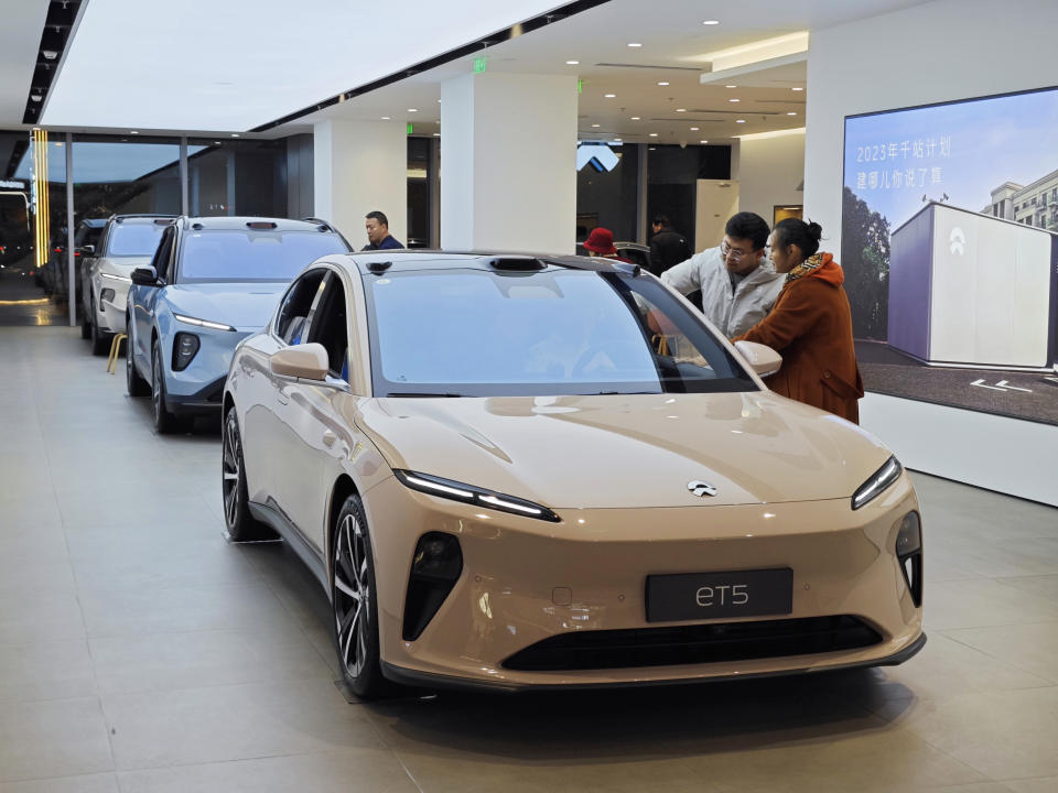 Citizens are learning about ET5 models at a NIO auto store in Yantai, Shandong province, China, on November 26, 2023. (Photo by Costfoto/NurPhoto via Getty Images)