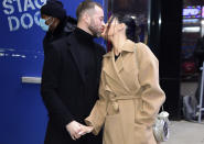 <p>Nikki Bella and Artem Chigvintsev are seen sharing a kiss outside <em>Good Morning America</em> on Jan. 25 in New York City. </p>