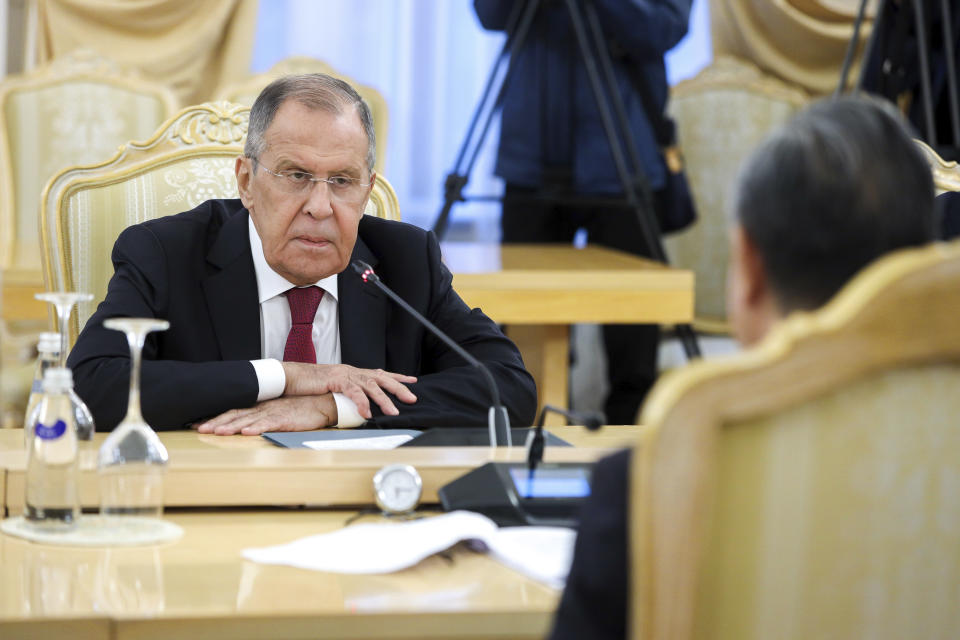 In this photo released by Russian Foreign Ministry Press Service, Russian Foreign Minister Sergey Lavrov, left, listens to Chinese Foreign Minister Wang Yi during their talks in Moscow, Russia, Monday, Sept. 18, 2023. (Russian Foreign Ministry Press Service via AP)