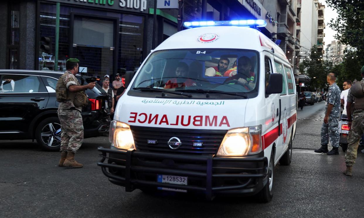 <span>An ambulance in Beirut after pagers exploded across Lebanon, killing at least nine people and wounding thousands.</span><span>Photograph: Mohamed Azakir/Reuters</span>