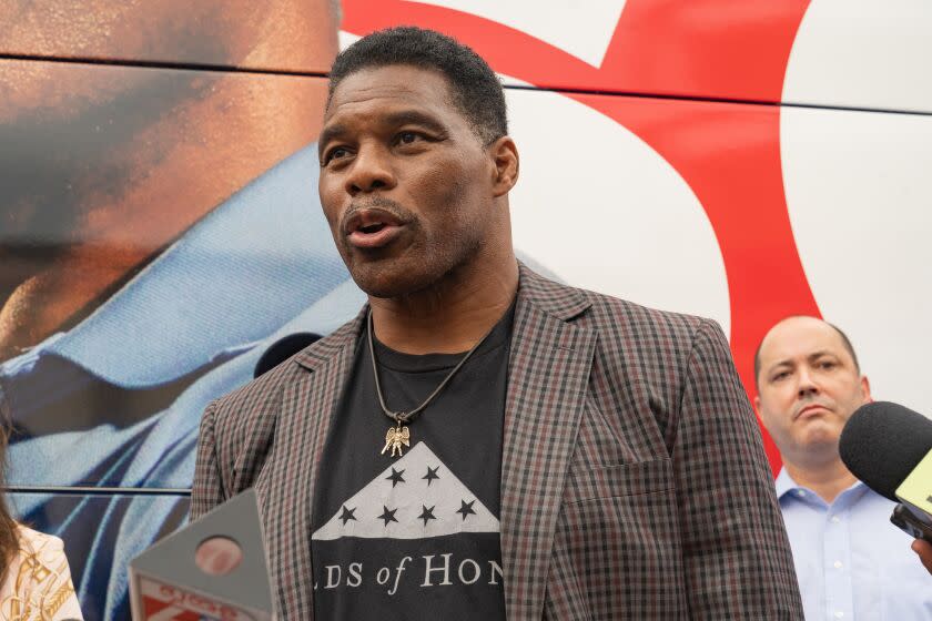 U.S. Republican Senate candidate for Georgia, Herschel Walker speaks to media at a campaign event in Gwinnett, Georgia.