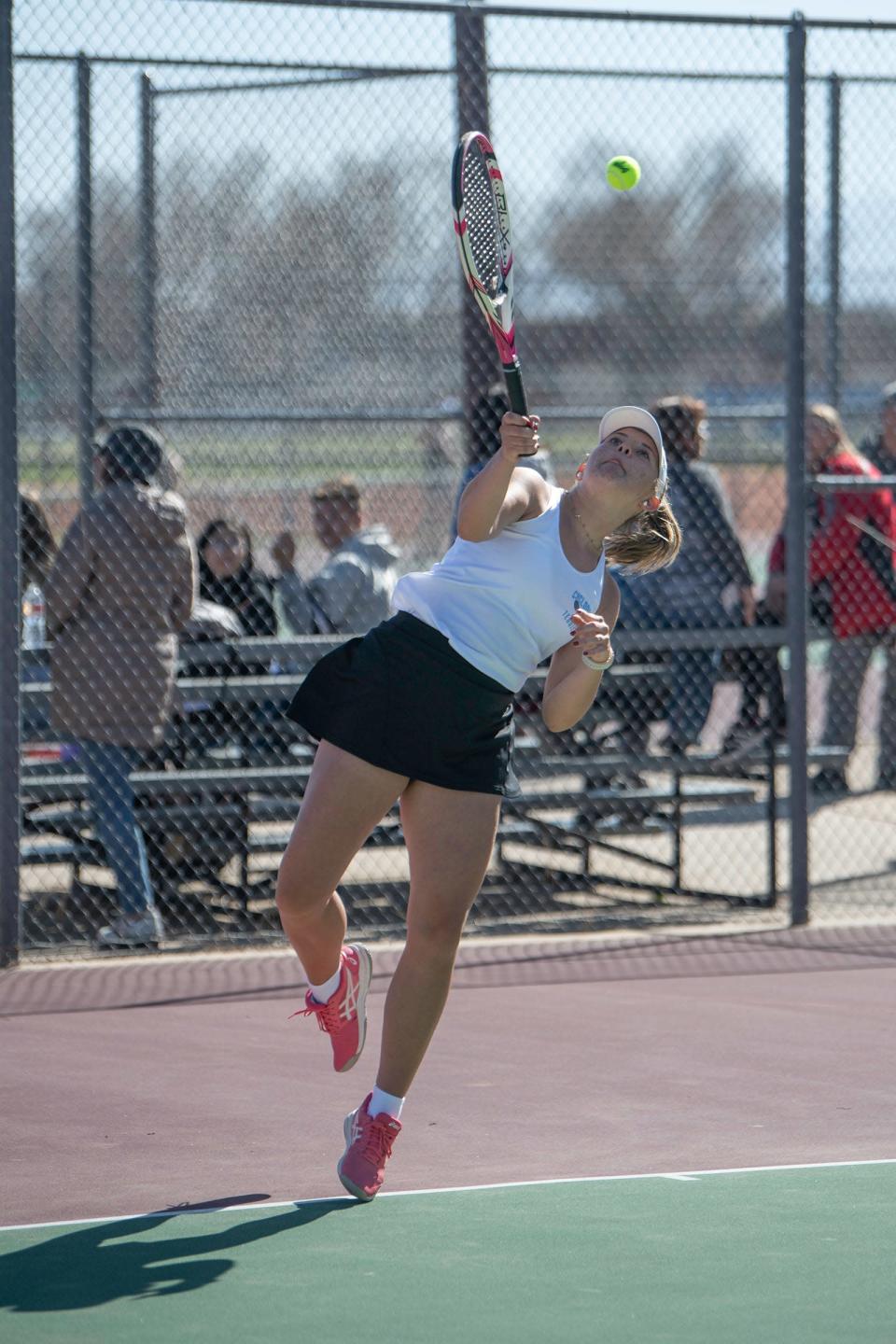 Pueblo West&#39;s Nele Grimsehl rockets off a serve during a match at Pueblo South on Thursday, April 7, 2022.