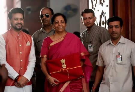 FILE PHOTO: India's Finance Minister Nirmala Sitharaman arrives to present the 2019 budget in Parliament, New Delhi, India