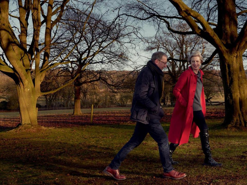 Theresa May with her husband Philip. Mrs May is wearing an Egg coat and a Sine for Egg sweater as she was photographed by Annie Leibovitz for American Vogue (Annie Leibovitz/Vogue)