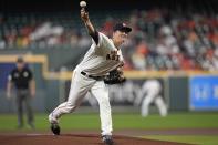 Houston Astros starting pitcher Zack Greinke throws against the Arizona Diamondbacks during the first inning of a baseball game Sunday, Sept. 19, 2021, in Houston. (AP Photo/David J. Phillip)