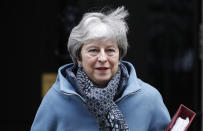 Britain's Prime Minister Theresa May leaves 10 Downing Street for the House of Commons for her weekly Prime Minister's Questions in London, Wednesday, Jan. 23, 2019. (AP Photo/Alastair Grant)