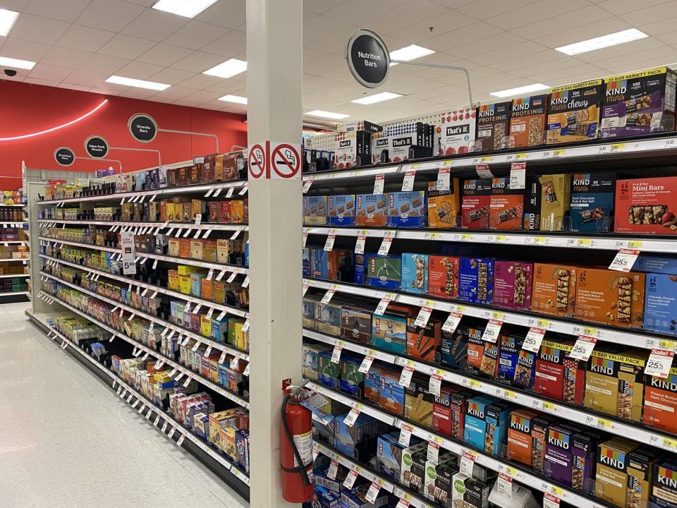 The nutrition bars sitting on shelves in a target