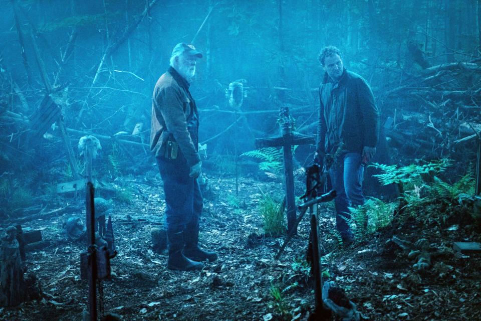John Lithgow and Jason Clarke in a pet cemetery 