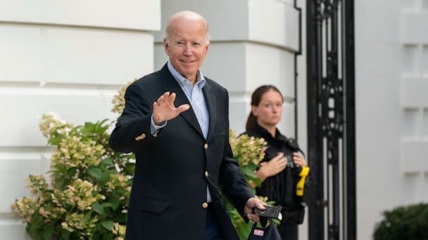 PHOTO: President Joe Biden waves as he walk to board Marine One on the South Lawn of the White House in Washington, on his way to his Rehoboth Beach, Del., home after his most recent COVID-19 isolation, Sunday, Aug. 7, 2022. (AP Photo/Manuel Balce Ceneta)