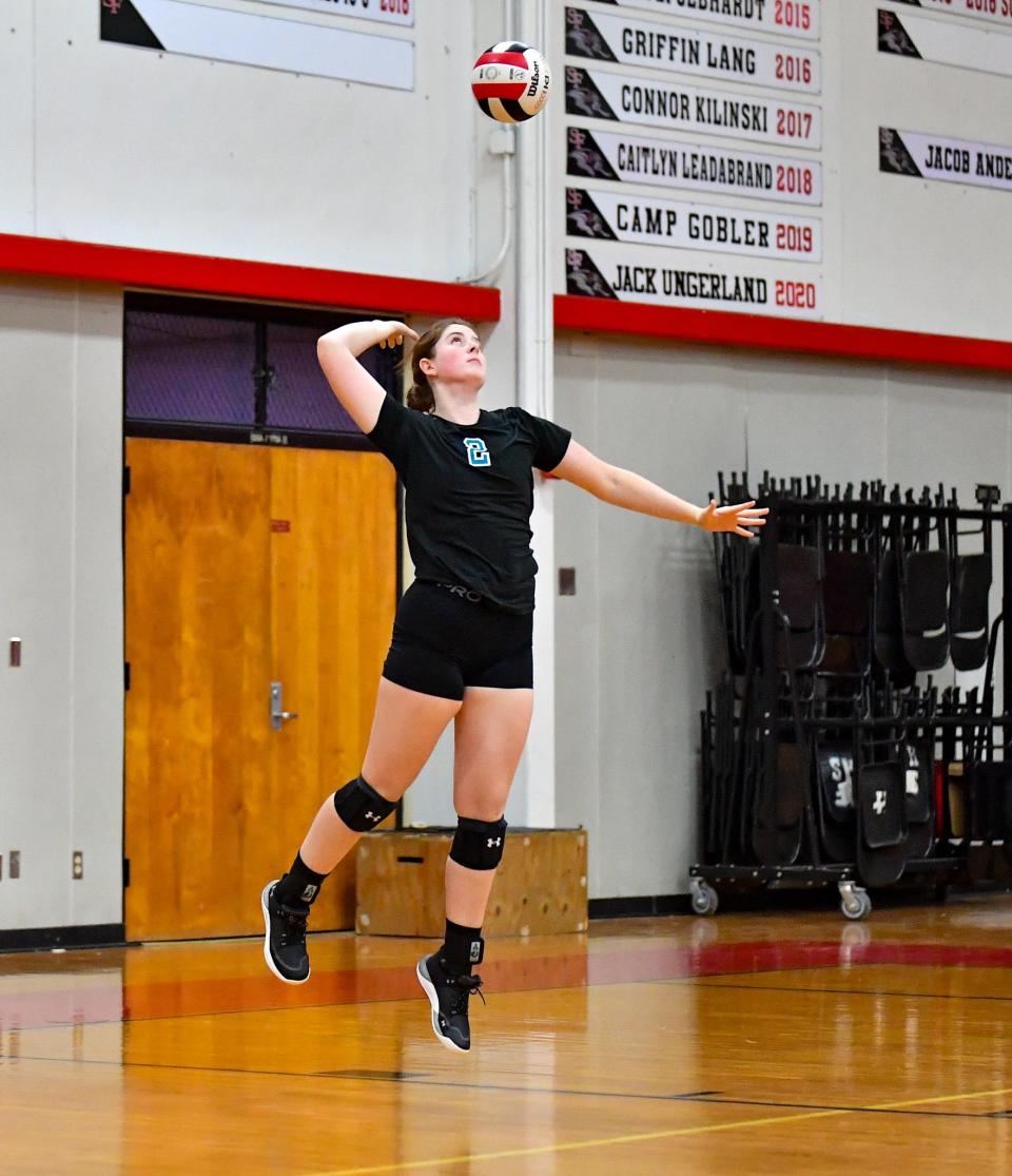 Jensen Beach Raegan Richardson (2) serves in a volleyball game against South Fork Thursday Sept. 14, 2023 in Martin County.