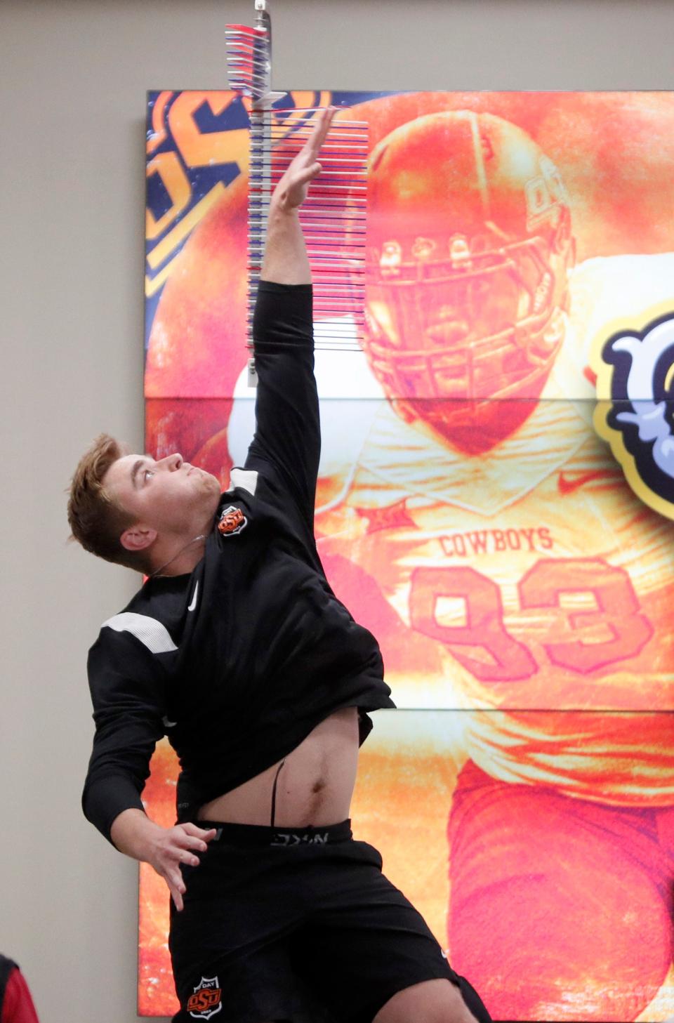 Oklahoma State's Matt Hembrough leaps during OSU Pro Day in Stillwater, Okla.,Wednesday, March 29, 2023. 