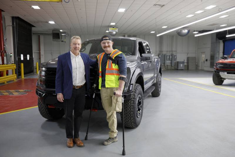 Ret. U.S. Marine Sgt. Tyler Vargas-Andrews met Ford executive chair Bill Ford while touring Dearborn Truck Plant on Tuesday, Feb. 13, 2024. Vargas-Andrews received a new Ford F-150 Raptor R from Ford after his 2023 Raptor was wrecked in an accident.