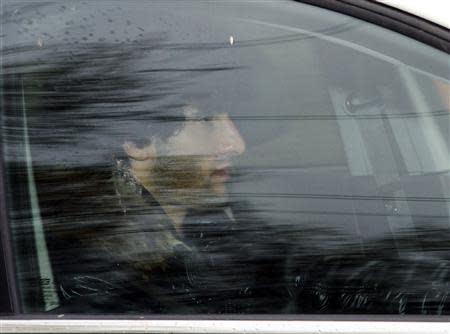 Manchester United's Maroune Fellaini leaves the club's Carrington training ground in Manchester, northern England April 22, 2014. REUTERS/Nigel Roddis