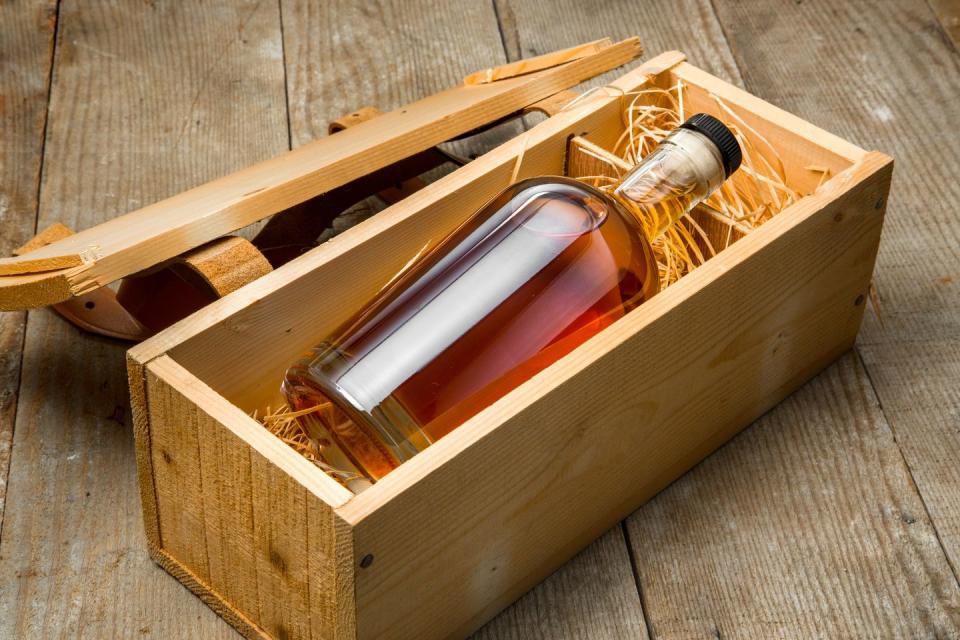 bourbon bottle in wooden box