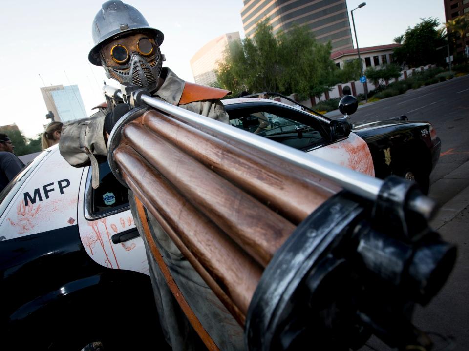 An Arizona Republic photographer captured this photo of Bryan Patrick Miller, dressed as a zombie hunter, during an October 2014 zombie walk in downtown Phoenix.