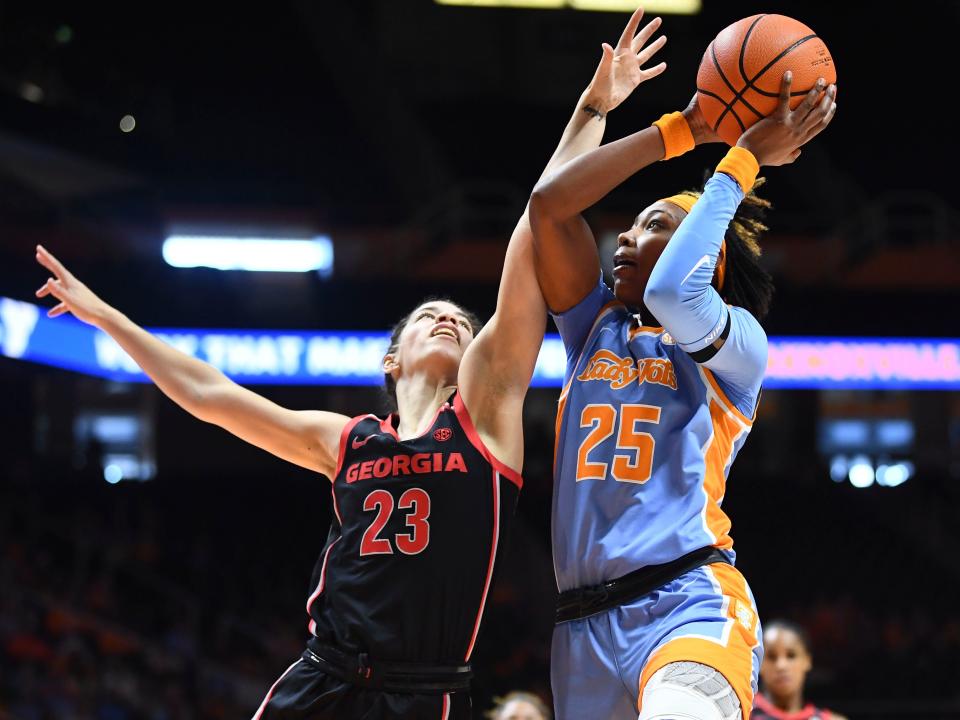 Tennessee's Jordan Horston (25) tries to score while guarded by Georgia guard Alisha Lewis (23) during the NCAA college basketball game between the Tennessee Lady Vols and Georgia on Sunday, January 15, 2023 in Knoxville, Tenn. 
