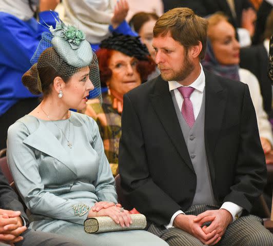 <p>OLGA MALTSEVA/AFP via Getty</p> Crown Princess Elia of Albania and Crown Prince Leka at the wedding of Grand Duke George Mikhailovich Romanov and Victoria Romanovna Bettarini at Saint Isaac's Cathedral in Saint Petersburg in October 2021.