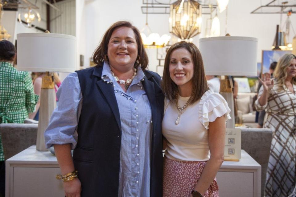 Dwell Boutique's owners Ashley Pomeroy and Christy Poche pose for a photo.