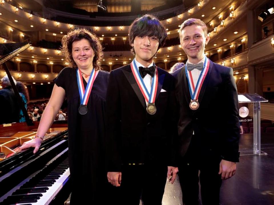 Yunchan Lim (center), 18, from South Korea, won the gold medal at the 2022 Van Cliburn International Piano Competition in Fort Worth. The silver medal was awarded to Russian pianist Anna Geniushene (lef), 31, and the bronze medal was awarded to Ukrainian pianist Dmytro Choni (right), 28.