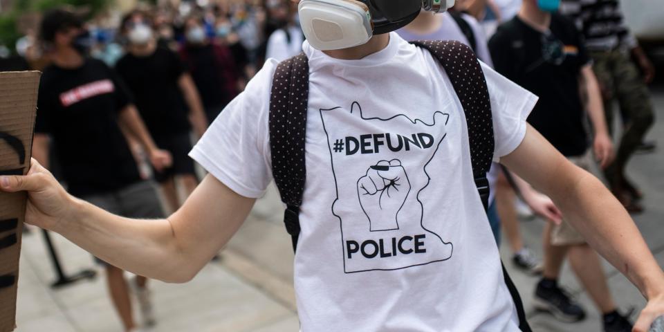 MINNEAPOLIS, MN - JUNE 6: Demonstrators calling to defund the Minneapolis Police Department march on Hennepin Avenue on June 6, 2020 in Minneapolis, Minnesota. The march, organized by the Black Visions Collective, commemorated the life of George Floyd who was killed by members of the MPD on May 25. (Photo by Stephen Maturen/Getty Images)