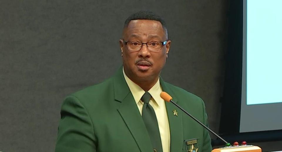 Sheriff Clovis Watson Jr. speaks to county commissioners on April 6, 2023, to discuss the possibility of providing free phone calls for inmates.