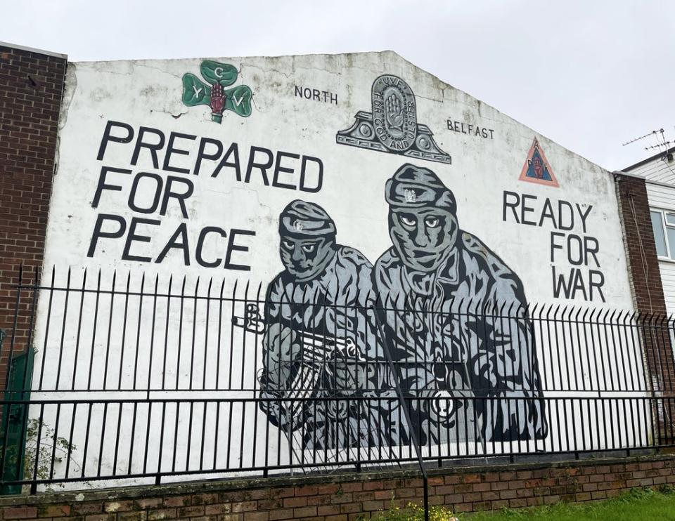 An Ulster Volunteer Force (UVF) mural on a wall at the entrance of the loyalist Mount Vernon housing estate in north Belfast (Liam McBurney/PA) (PA Wire)