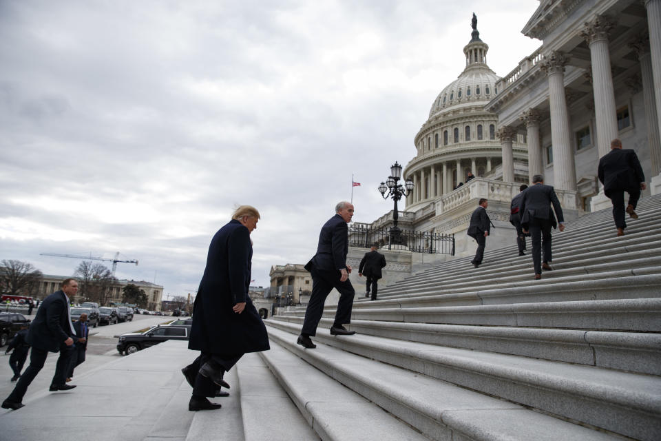 FILE - President Donald Trump arrives on Capitol Hill for a Senate Republican policy lunch, Jan. 9, 2019, in Washington. (AP Photo/ Evan Vucci, File)