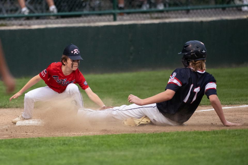 Rutland third baseman Ryan Frederick tags out Holden's Kellen Dzik to end the top of the fifth.