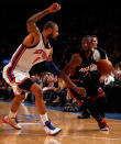 NEW YORK, NY - MAY 06: Dwyane Wade #3 of the Miami Heat drives drives in the third quarter against Tyson Chandler #6 of the New York Knicks in Game Four of the Eastern Conference Quarterfinals in the 2012 NBA Playoffs on May 6, 2012 at Madison Square Garden in New York City. NOTE TO USER: User expressly acknowledges and agrees that, by downloading and or using this photograph, User is consenting to the terms and conditions of the Getty Images License Agreement (Photo by Jeff Zelevansky/Getty Images)